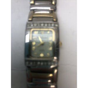 Women’s Time Zone quartz watch. Very nice detail. Works well.